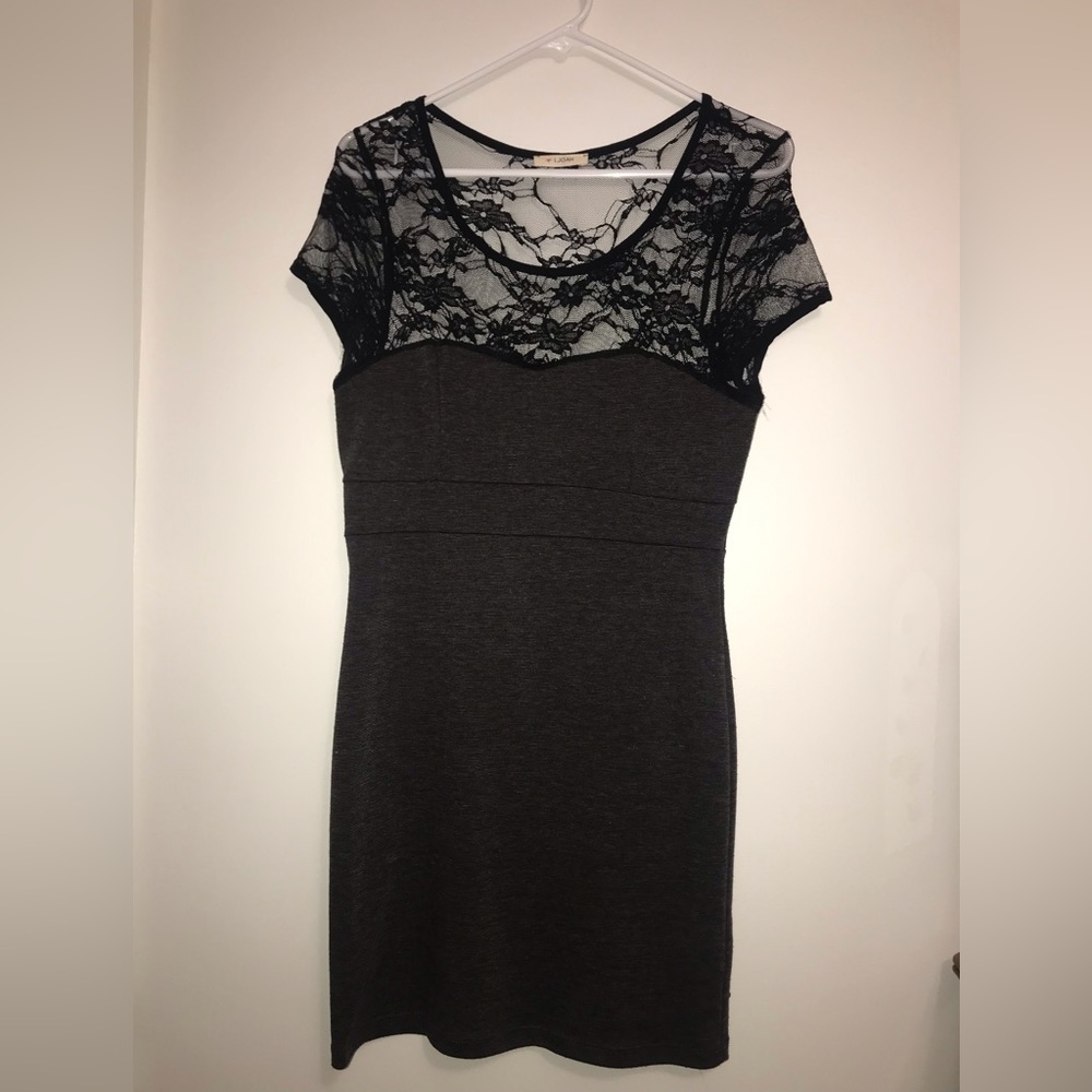 Slim fit, Medium dress. Gray with black lace on shoulders/sleeves.